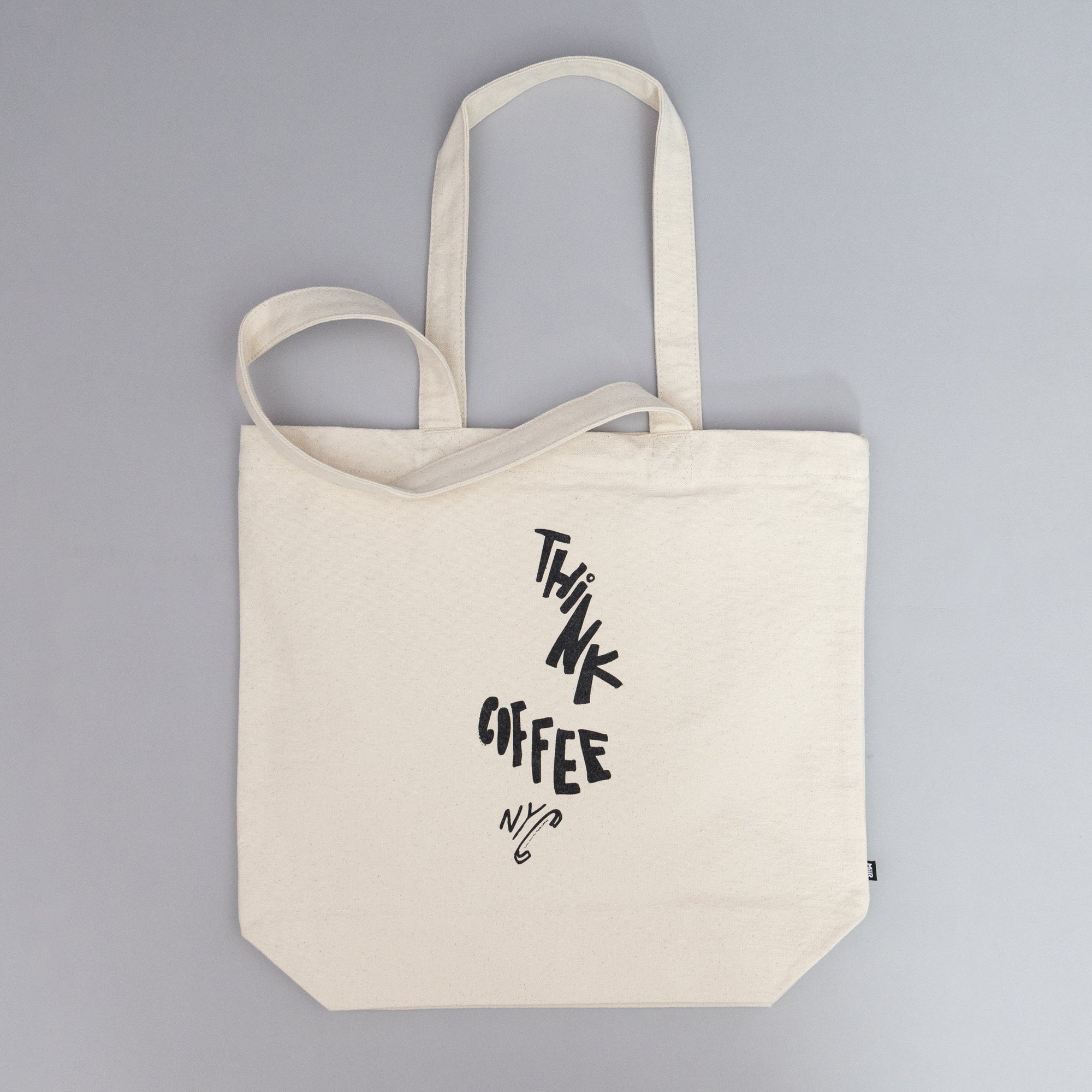 Beige tote bag with 'Think Coffee NYC' branding