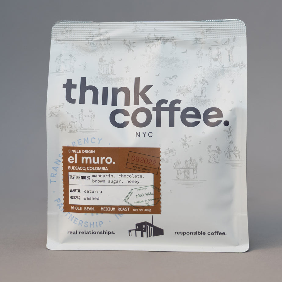 Think Coffee NYC packaging with 'melky chaves' label on a gray background